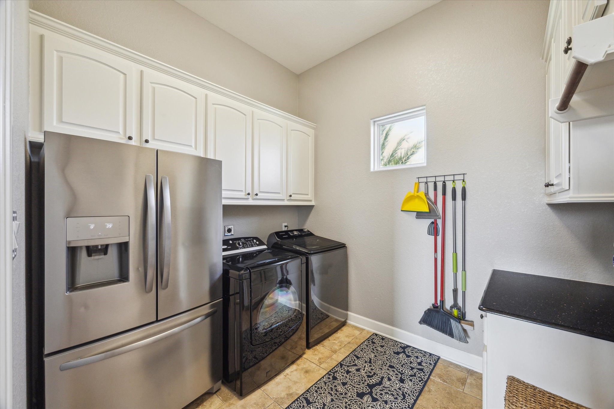 7 Ramrod Hitchcock, TX 77563 - Photo 27 of 41 a kitchen with stainless steel appliances granite countertop a refrigerator a stove and a sink