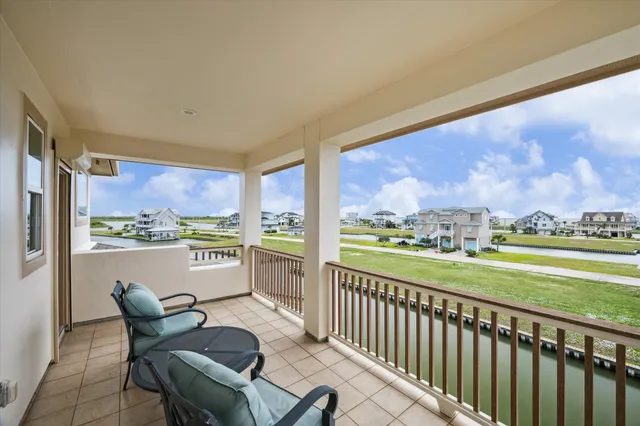 a view of a two chair in the balcony