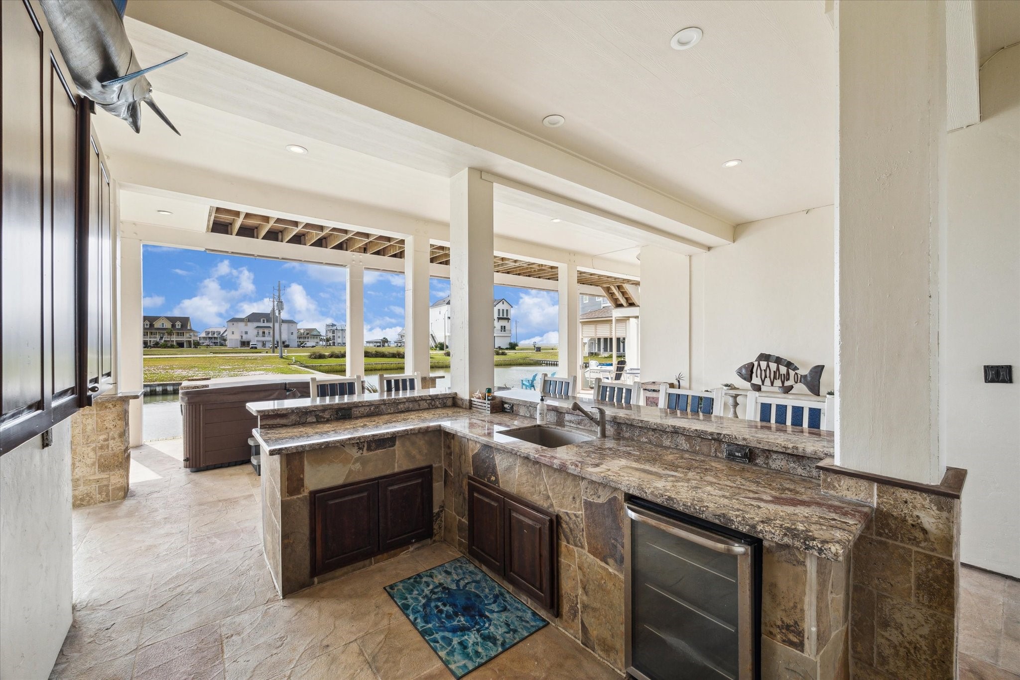 7 Ramrod Hitchcock, TX 77563 - Photo 36 of 41 a kitchen with stainless steel appliances granite countertop a stove and a sink