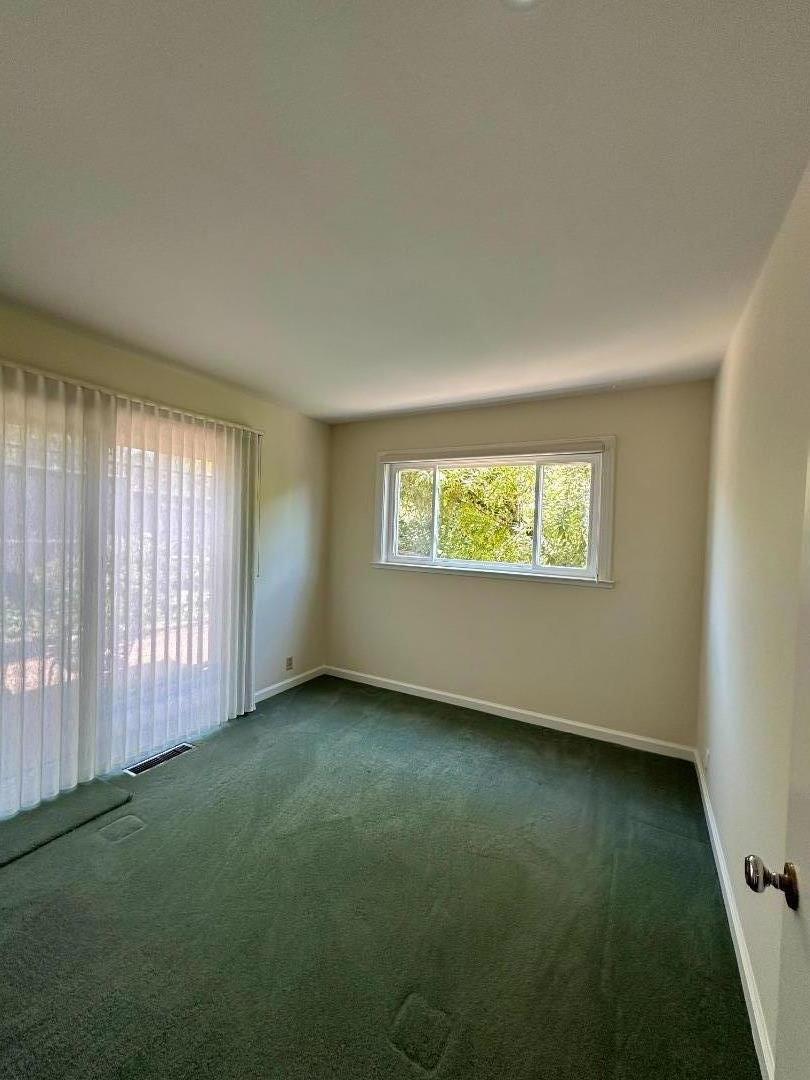 46 Arch Lane San Carlos, CA 94070 - Photo 17 of 22 an empty room with a window