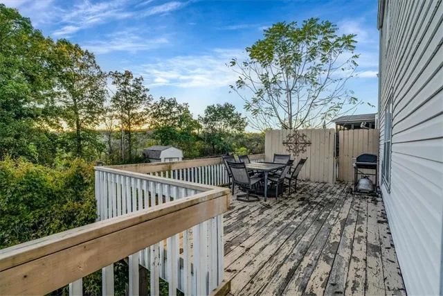 a view of balcony with furniture