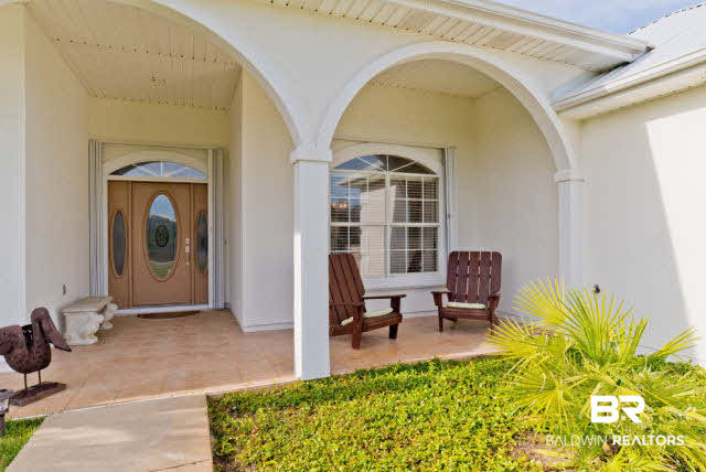 31275 River Road Orange Beach, AL 36561 - Photo 25 of 32 Covered porch is 20' x 6'