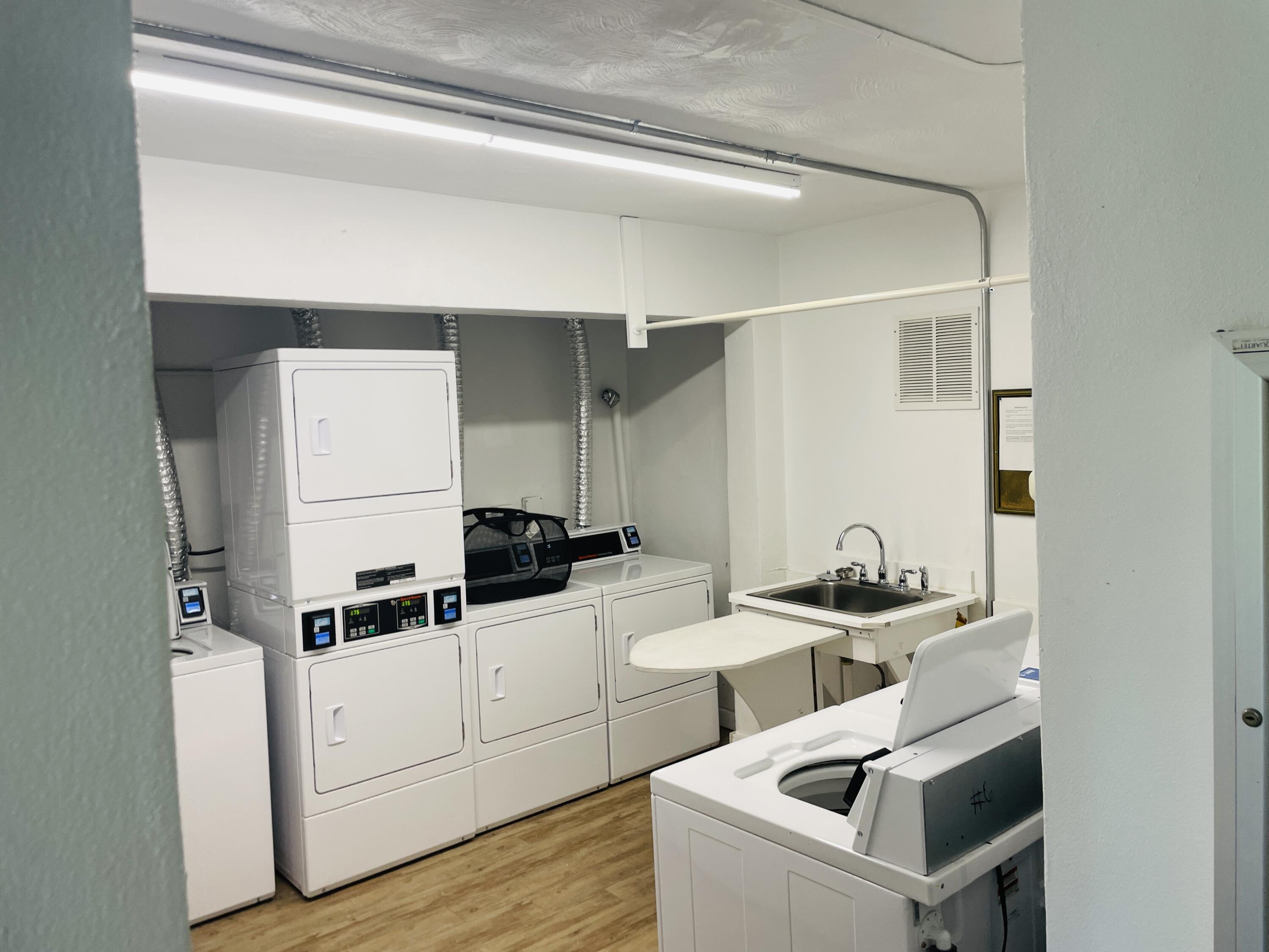 2100 Northeast 38th Street, Unit 142 Lighthouse Point, FL 33064 - Photo 38 of 42 Common Laundry