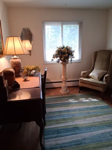 a vase of flowers sitting on a table