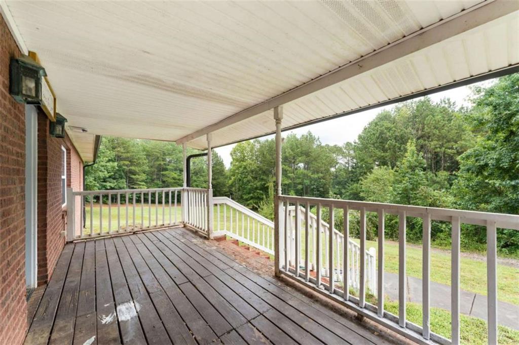 159 Moores Ferry Road Southwest Plainville, GA 30733 - Photo 11 of 43 a view of balcony with wooden floor