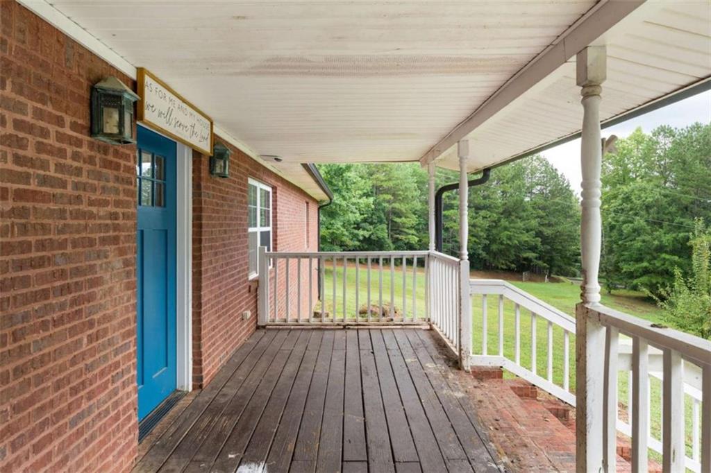 159 Moores Ferry Road Southwest Plainville, GA 30733 - Photo 12 of 43 a view of balcony with wooden floor