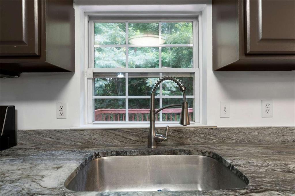 159 Moores Ferry Road Southwest Plainville, GA 30733 - Photo 24 of 43 a kitchen with a sink and a window