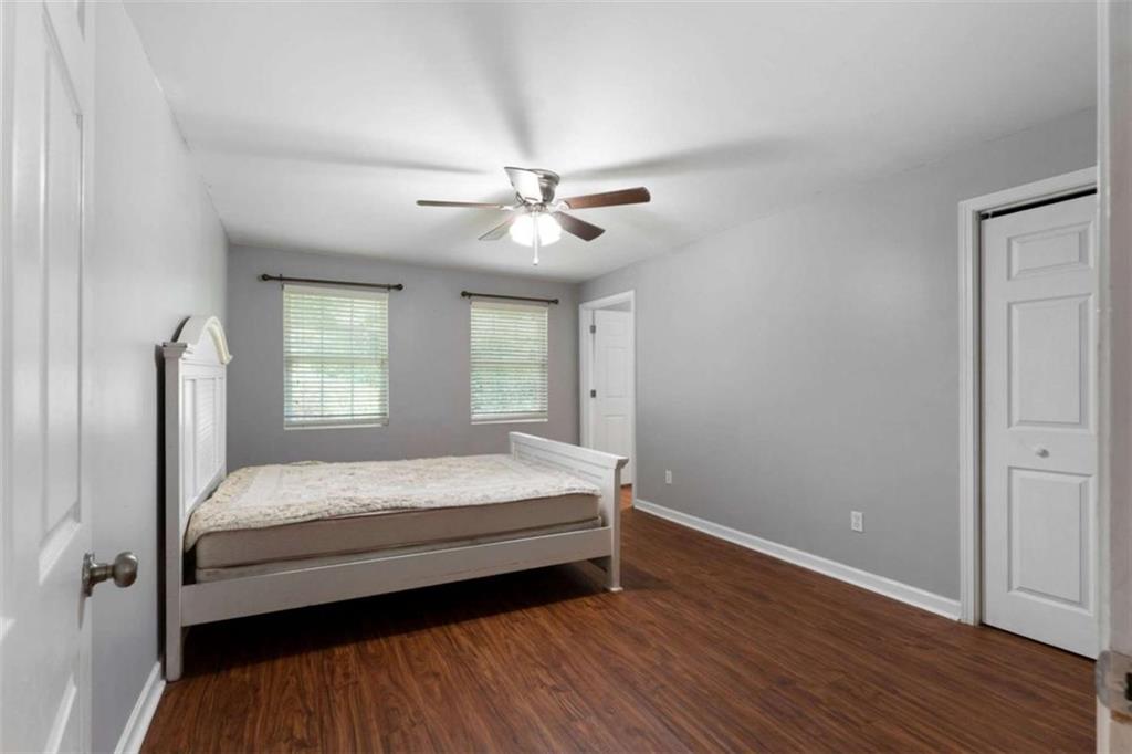 159 Moores Ferry Road Southwest Plainville, GA 30733 - Photo 33 of 43 a bedroom with a bed and a window