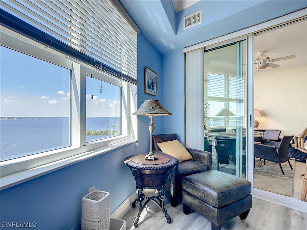 2797 First Street, Unit 1502 Fort Myers, FL 33916 - Photo 16 of 49 a living room with furniture and a window