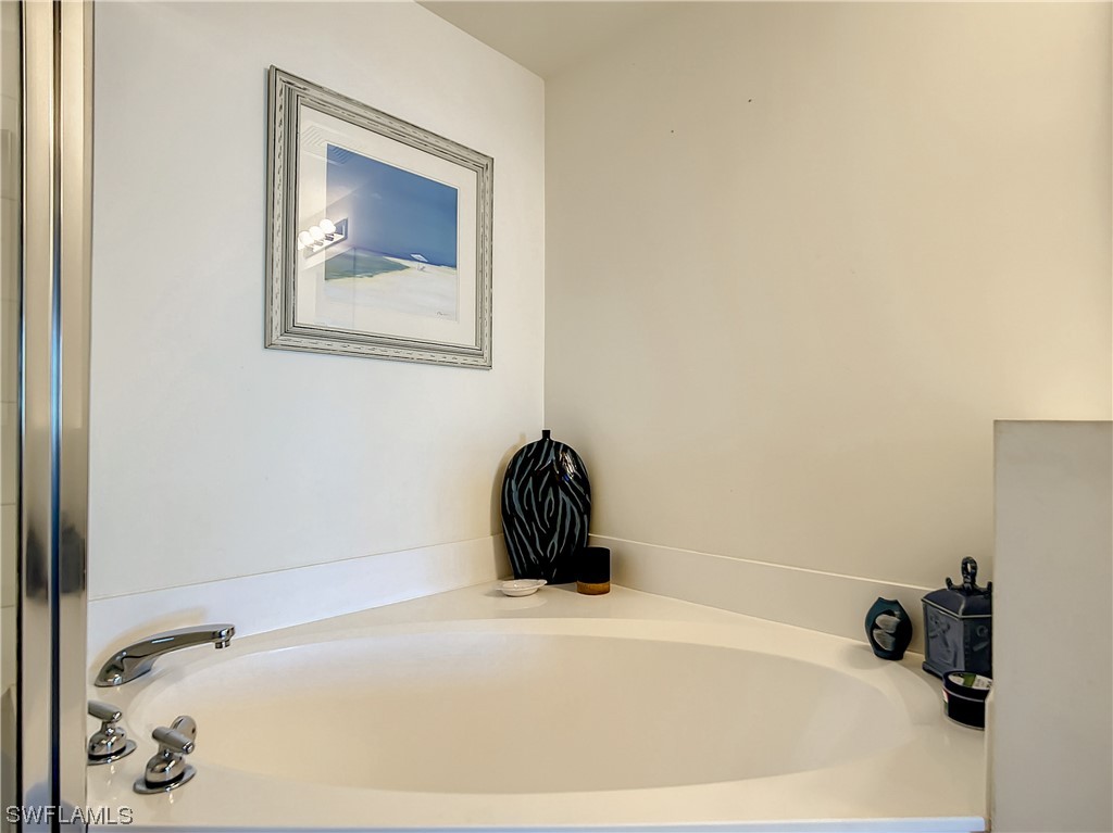 2797 First Street, Unit 1502 Fort Myers, FL 33916 - Photo 19 of 49 a bathroom with a bathtub