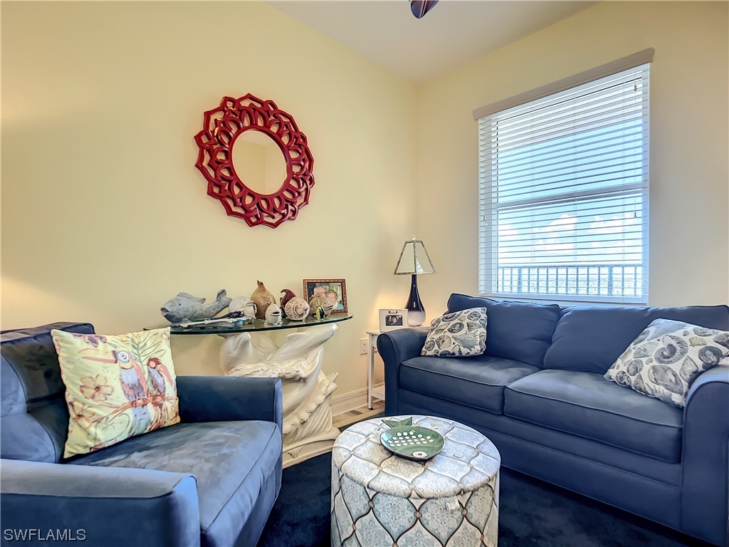 2797 First Street, Unit 1502 Fort Myers, FL 33916 - Photo 26 of 49 a living room with furniture and a couch