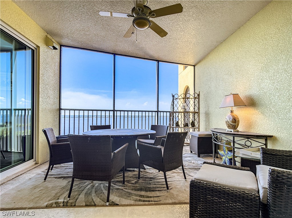 2797 First Street, Unit 1502 Fort Myers, FL 33916 - Photo 28 of 49 a view of a dining room with furniture window and outside view