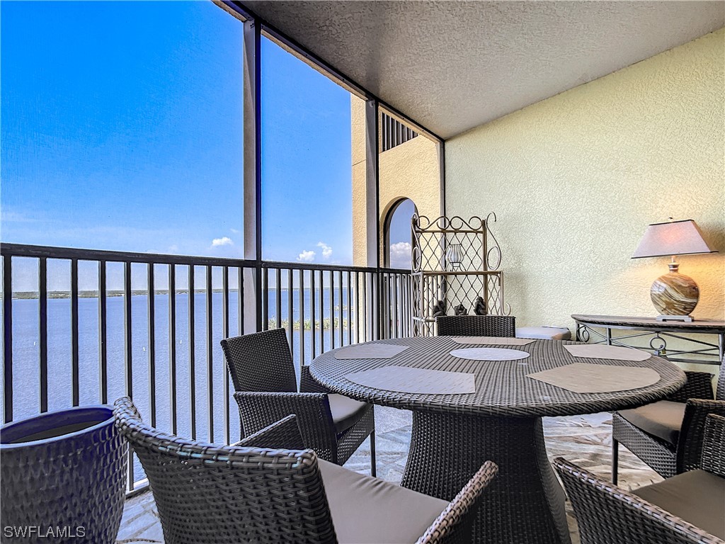 2797 First Street, Unit 1502 Fort Myers, FL 33916 - Photo 29 of 49 a view of a dining room with furniture and wooden floor