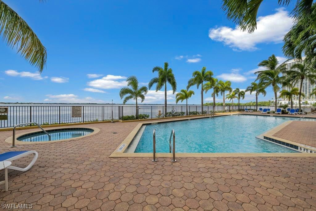 2797 First Street, Unit 1502 Fort Myers, FL 33916 - Photo 44 of 49 swimming pool with outdoor seating