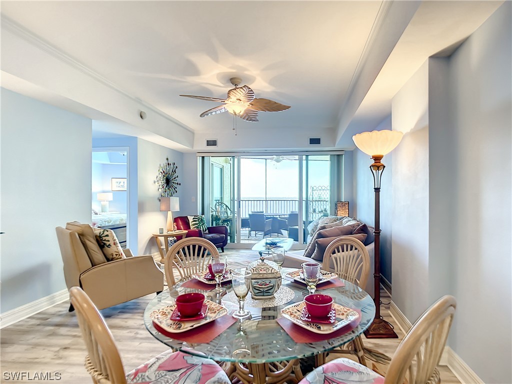 2797 First Street, Unit 1502 Fort Myers, FL 33916 - Photo 7 of 49 a view of a dining room with furniture window and outside view