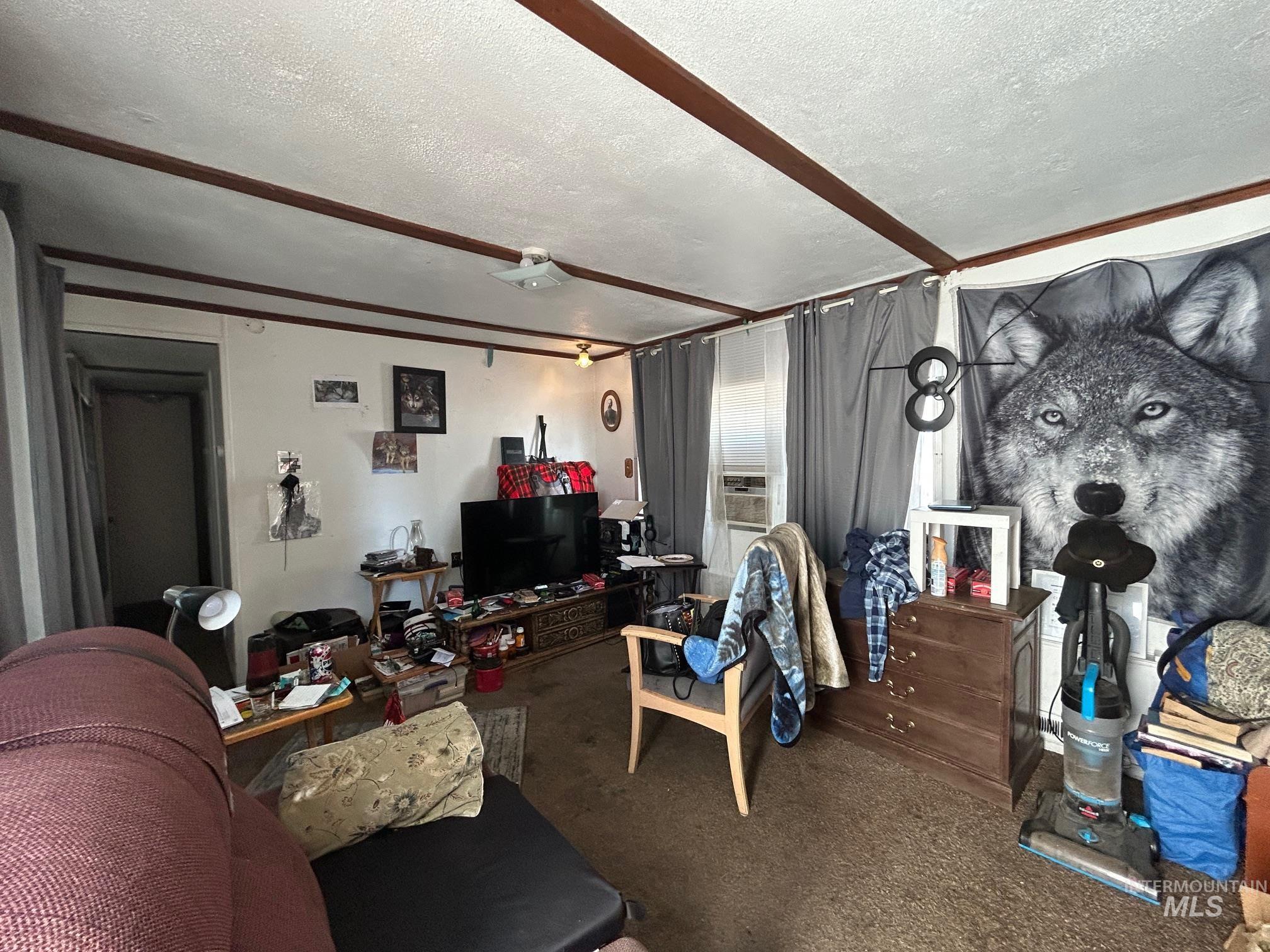1383 Fair Street, Unit 7 Clarkston, WA 99403 - Photo 7 of 15 Living room with a textured ceiling and carpet