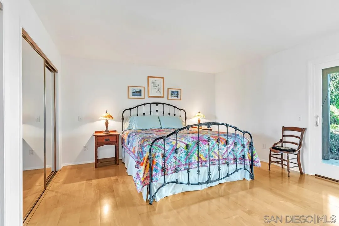 290 North Old Hill Road Fallbrook, CA 92028 - Photo 12 of 47 a bedroom with a bed window and a baby crib