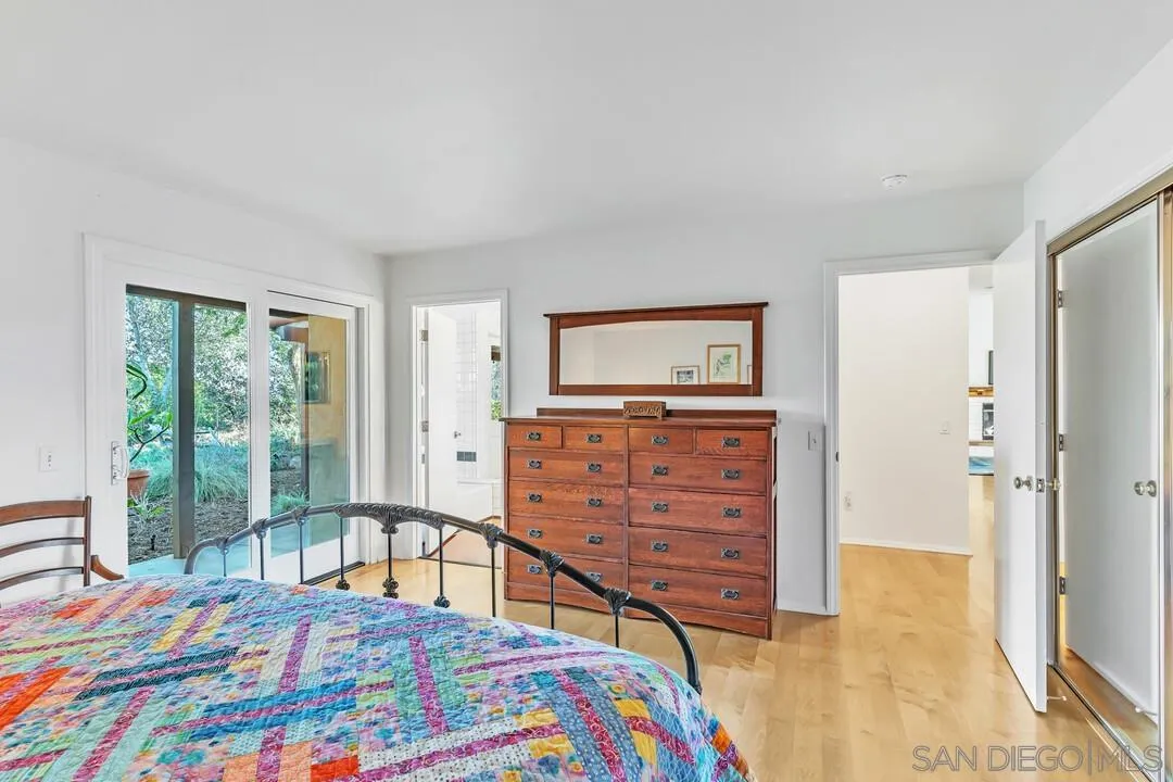 290 North Old Hill Road Fallbrook, CA 92028 - Photo 13 of 47 a bedroom with a bed and a dresser in it