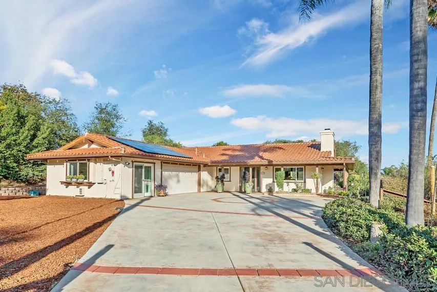 290 North Old Hill Road Fallbrook, CA 92028 - Photo 3 of 47 a view of a white house with a yard