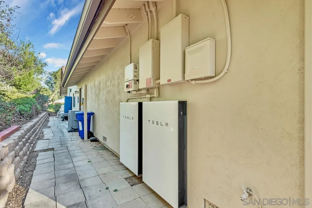 290 North Old Hill Road Fallbrook, CA 92028 - Photo 40 of 47 a view of a hallway with wooden floor and door