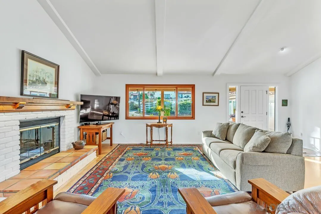 290 North Old Hill Road Fallbrook, CA 92028 - Photo 5 of 47 a living room with furniture a flat screen tv and a fireplace