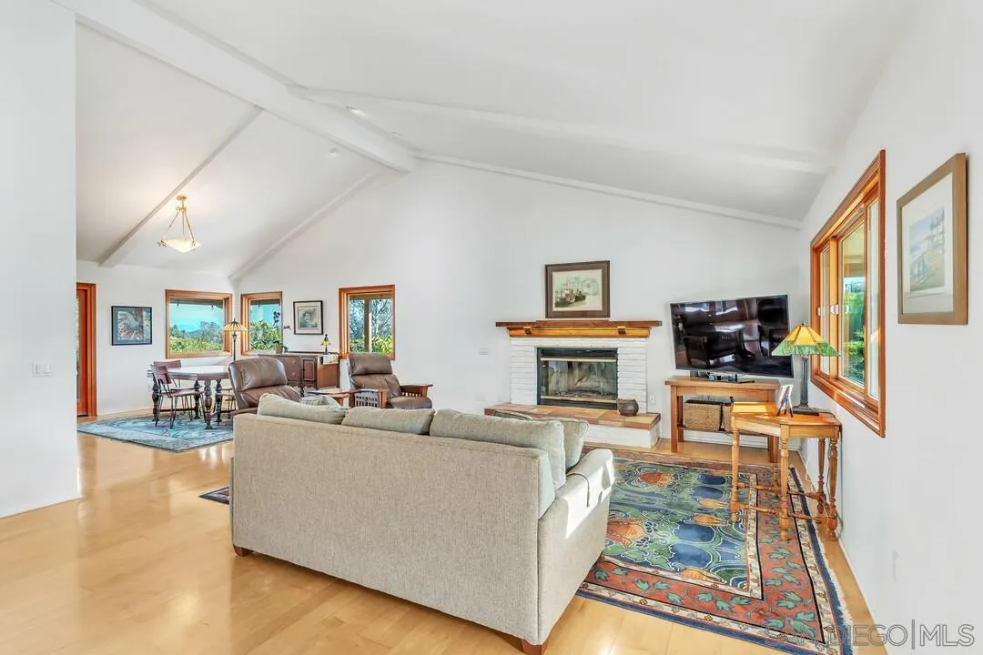 290 North Old Hill Road Fallbrook, CA 92028 - Photo 7 of 47 a living room with furniture and a flat screen tv