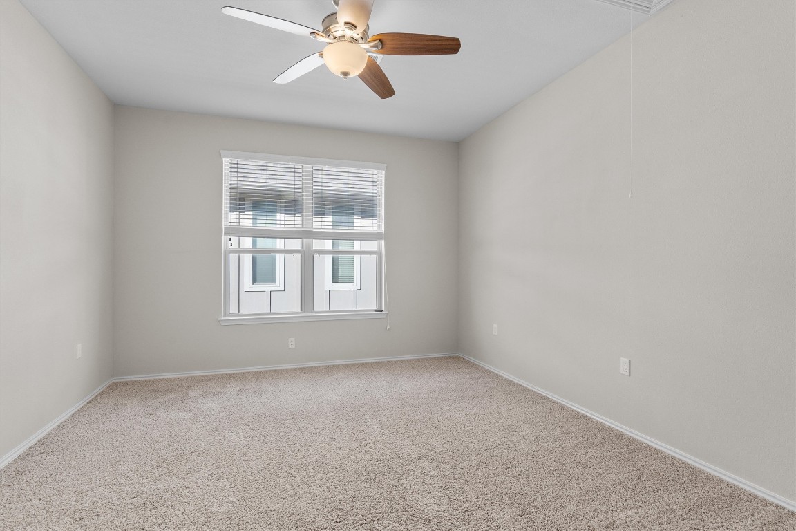 9416 Hunter Lane Austin, TX 78748 - Photo 16 of 35 an empty room with a window