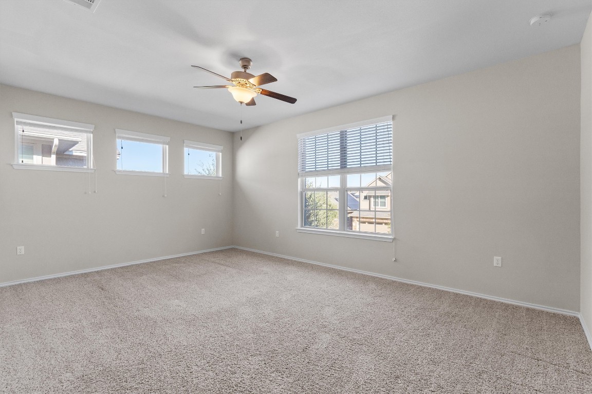 9416 Hunter Lane Austin, TX 78748 - Photo 18 of 35 a view of an empty room with a window