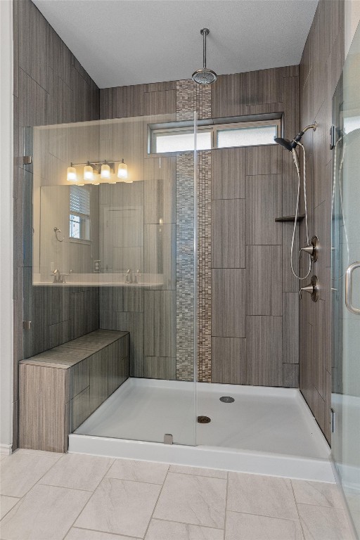 9416 Hunter Lane Austin, TX 78748 - Photo 23 of 35 a bathroom with a shower and a tub