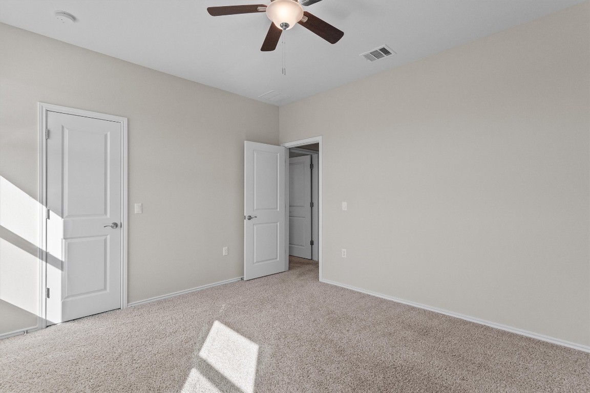 9416 Hunter Lane Austin, TX 78748 - Photo 27 of 35 a view of an empty room and chandelier fan