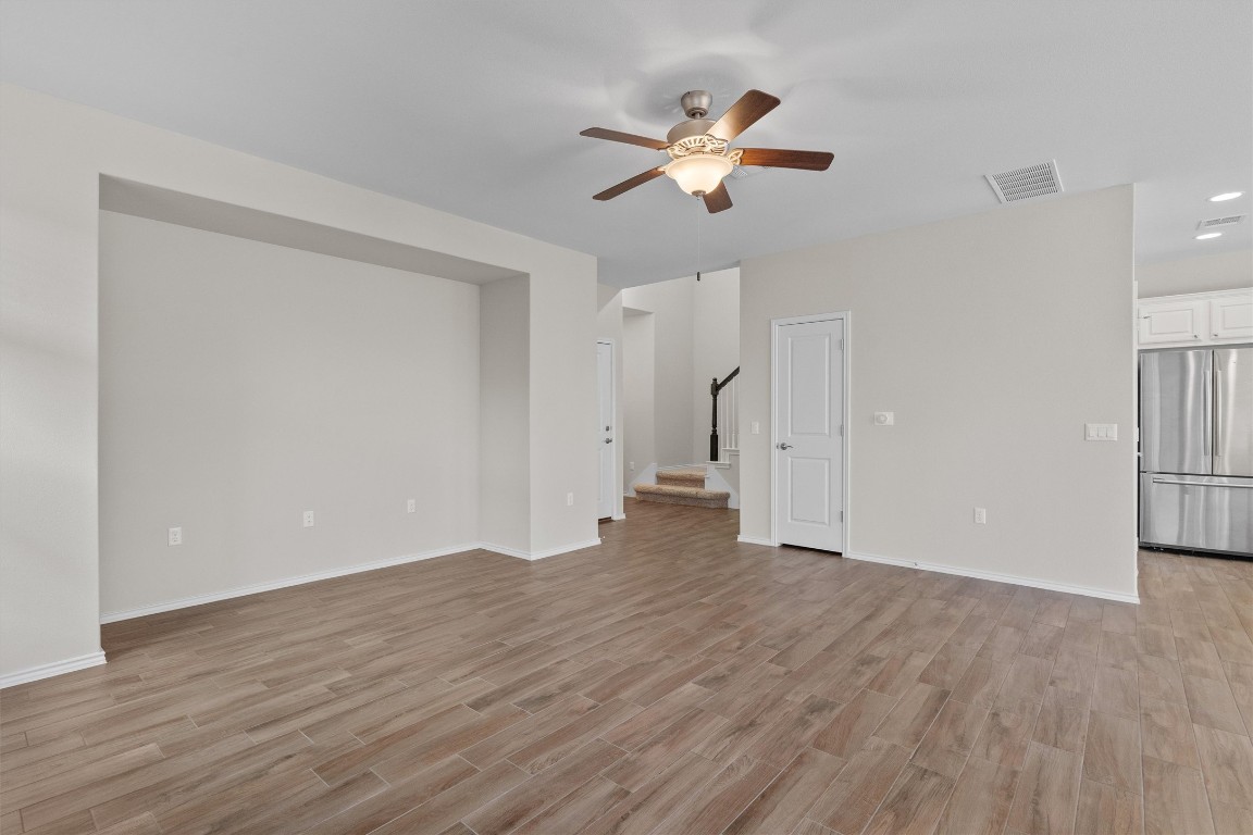 9416 Hunter Lane Austin, TX 78748 - Photo 7 of 35 a view of an empty room with wooden floor