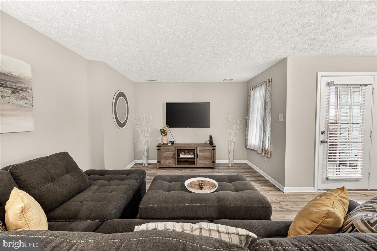 2141 Wainwright Court, Unit BA Frederick, MD 21702 - Photo 11 of 42 Modern living space with inviting ambiance.