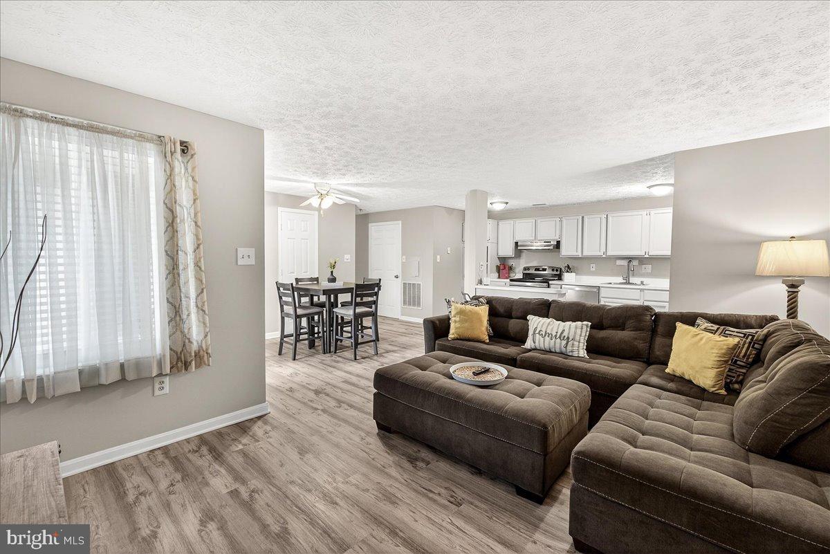 2141 Wainwright Court, Unit BA Frederick, MD 21702 - Photo 12 of 42 Bright and inviting open-concept living space.
