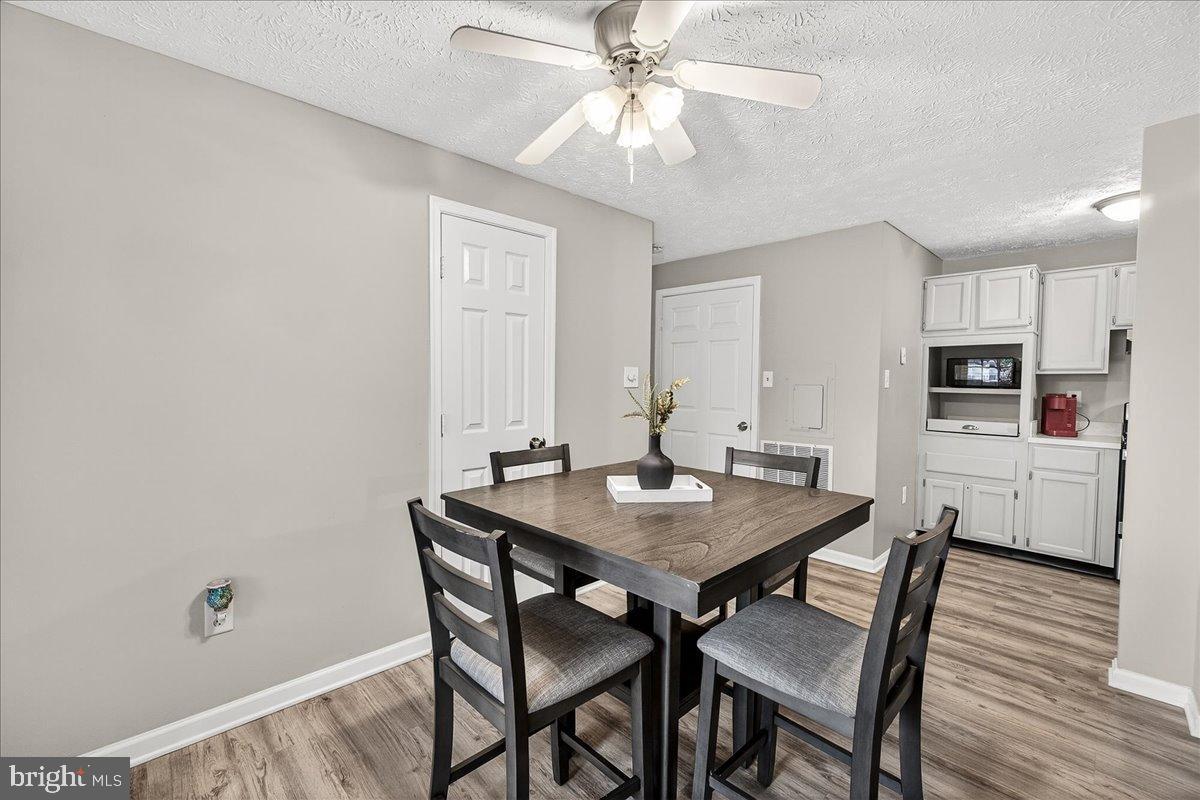 2141 Wainwright Court, Unit BA Frederick, MD 21702 - Photo 14 of 42 Modern dining space with natural light.