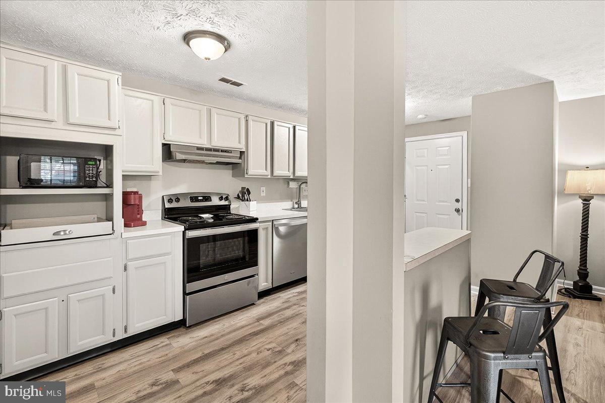 2141 Wainwright Court, Unit BA Frederick, MD 21702 - Photo 15 of 42 Modern kitchen with sleek finishes.