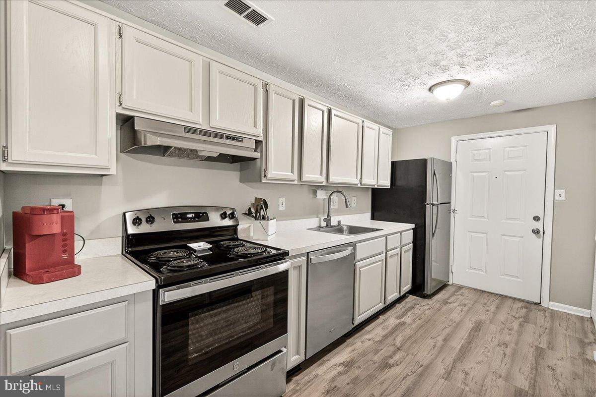 2141 Wainwright Court, Unit BA Frederick, MD 21702 - Photo 16 of 42 Modern kitchen with sleek appliances.