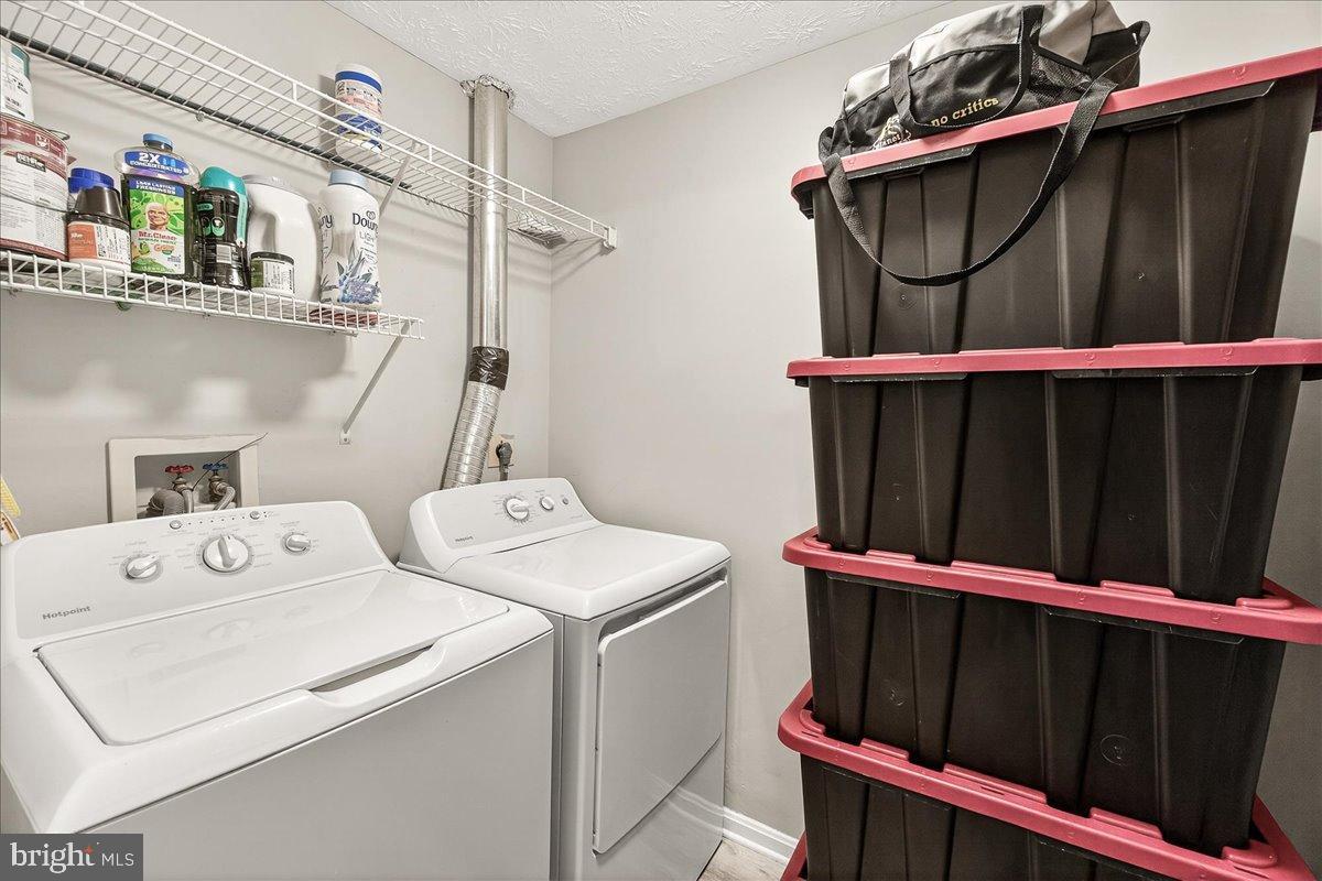 2141 Wainwright Court, Unit BA Frederick, MD 21702 - Photo 18 of 42 Efficient laundry space with smart storage.