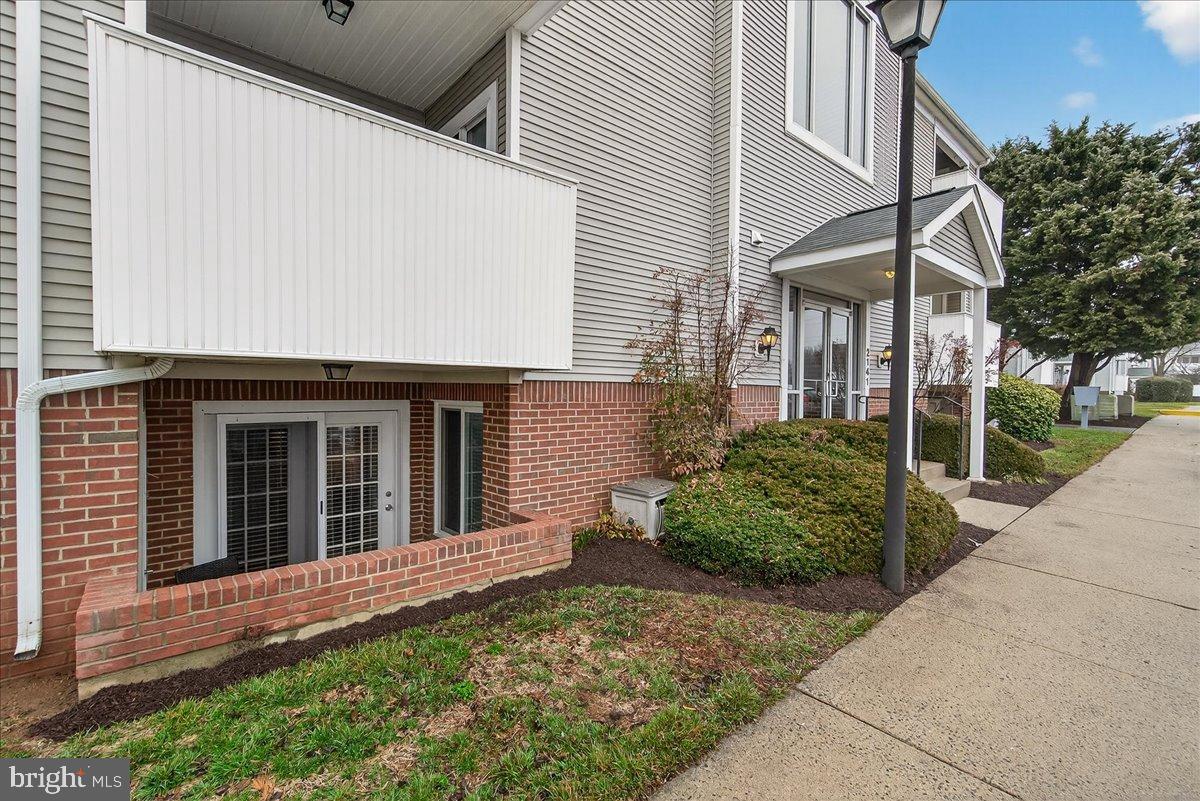 2141 Wainwright Court, Unit BA Frederick, MD 21702 - Photo 26 of 42 Charming exterior with lush landscaping.