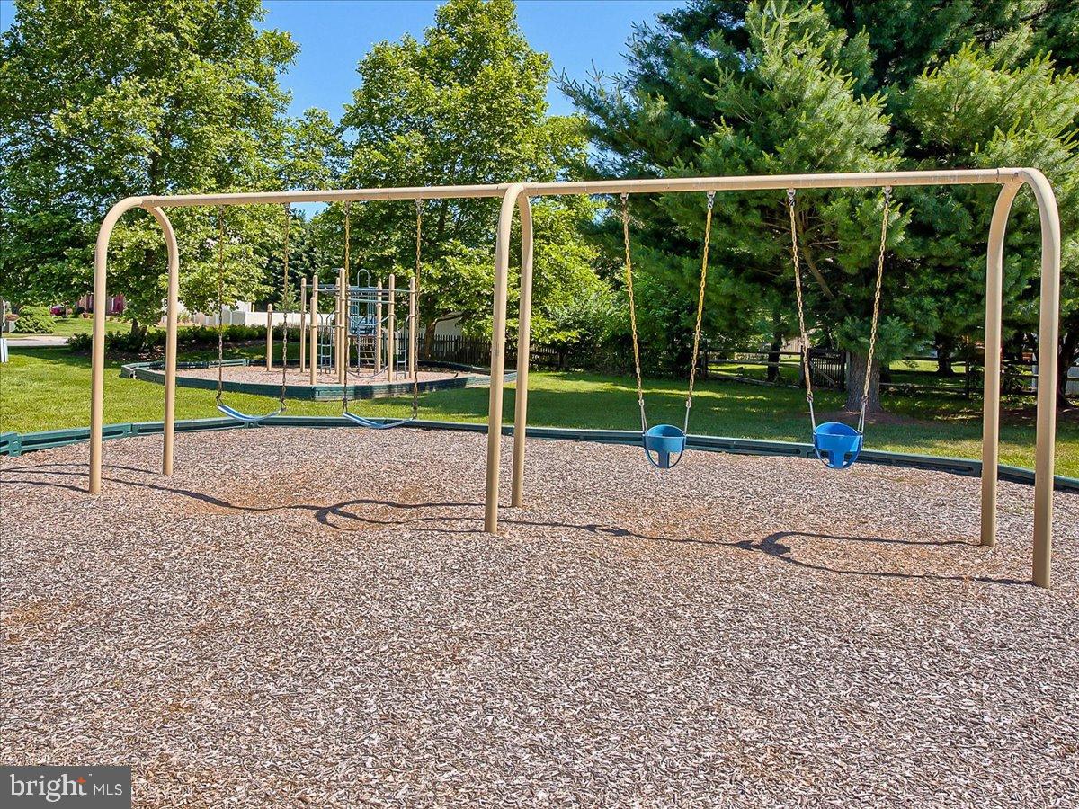 2141 Wainwright Court, Unit BA Frederick, MD 21702 - Photo 27 of 42 Sunny playground with inviting swings.