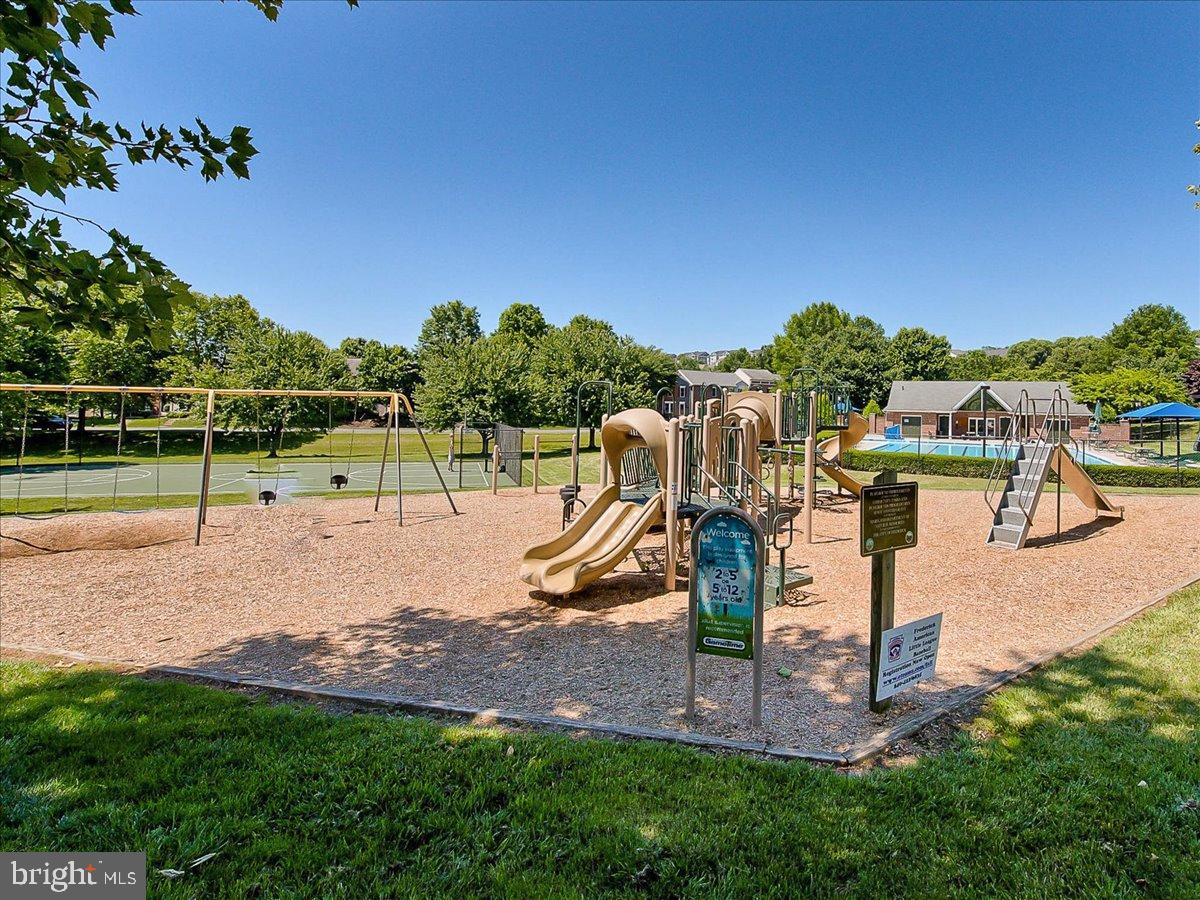 2141 Wainwright Court, Unit BA Frederick, MD 21702 - Photo 34 of 42 Sunny playground with slides and swings.