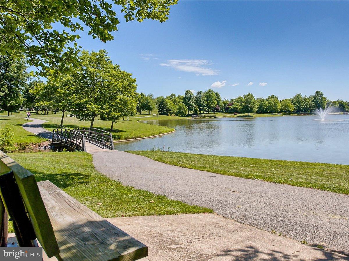 2141 Wainwright Court, Unit BA Frederick, MD 21702 - Photo 37 of 42 Serene park with a tranquil pond view.