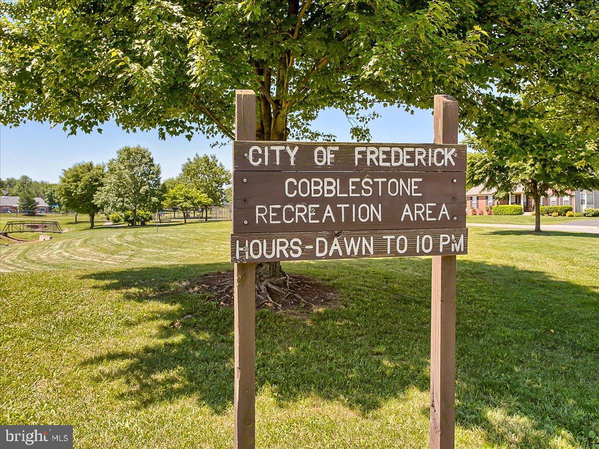 2141 Wainwright Court, Unit BA Frederick, MD 21702 - Photo 38 of 42 Frederick's Cobblestone Recreation Area Sign
