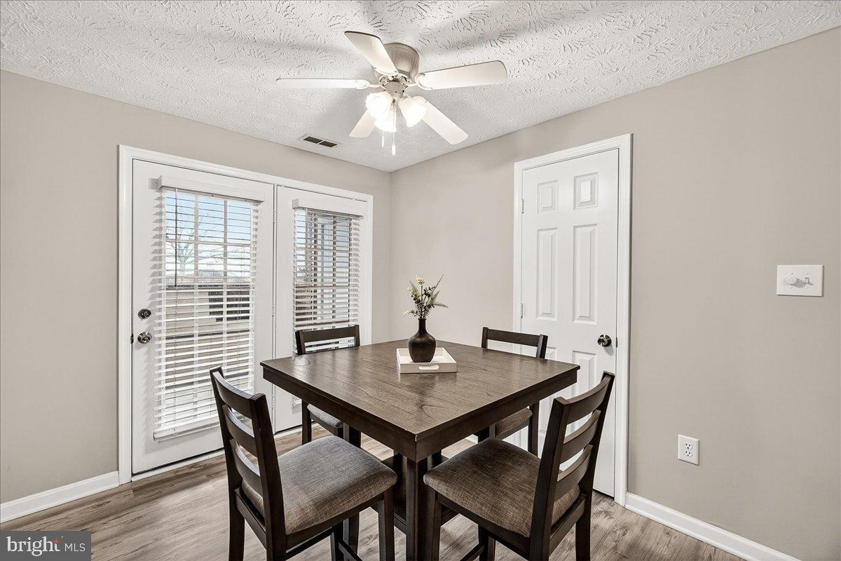 2141 Wainwright Court, Unit BA Frederick, MD 21702 - Photo 7 of 42 Bright dining area with natural light.