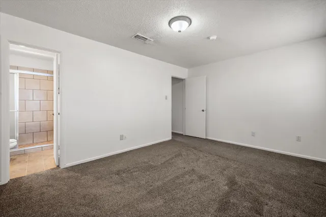 an empty room with an entryway