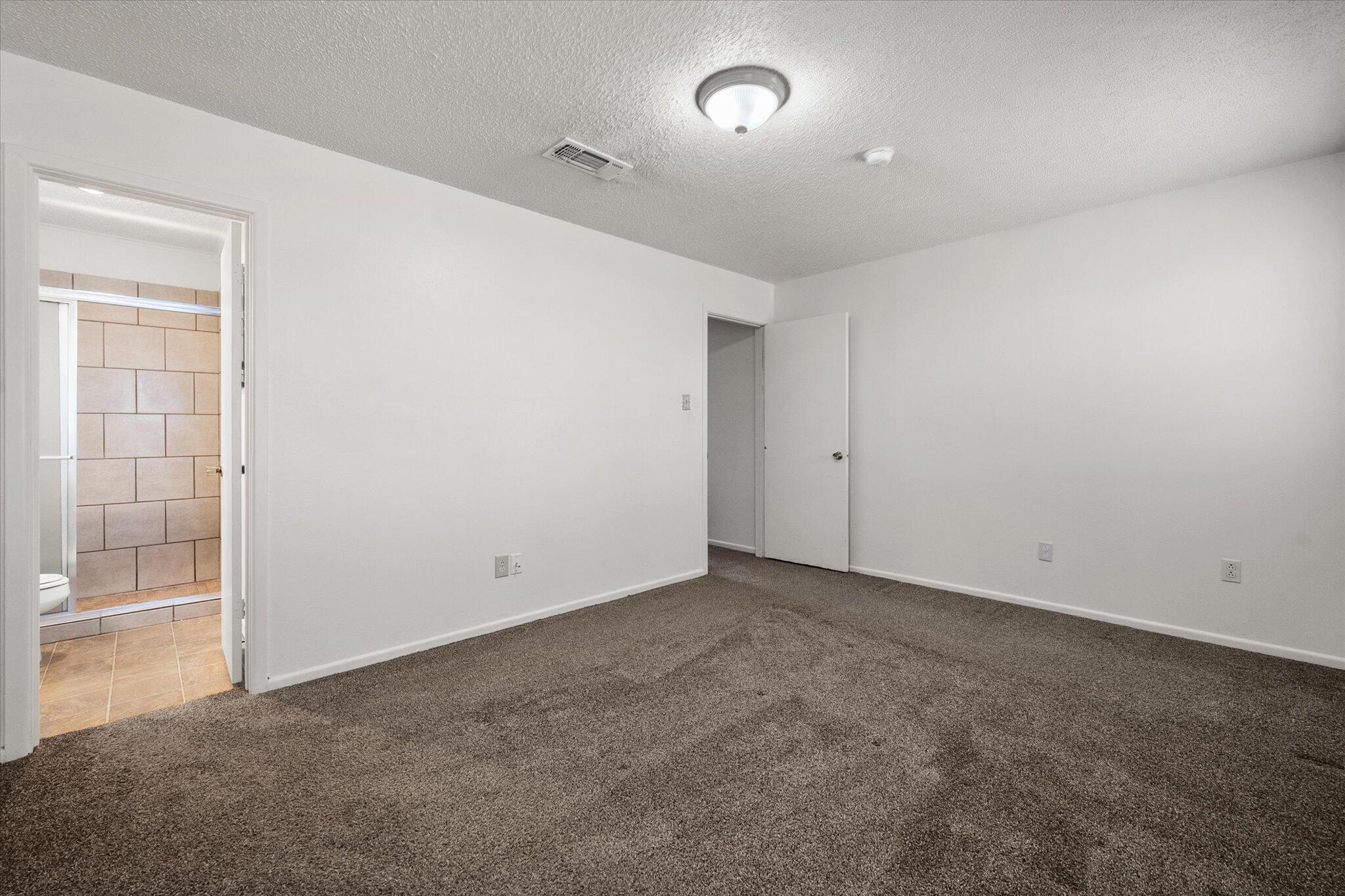 1503 Elkhart Avenue Lubbock, TX 79416 - Photo 23 of 28 an empty room with an entryway