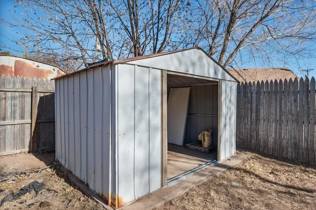 a view of a backyard of the house