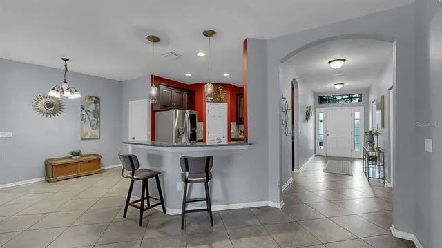 a view of a hallway with workspace