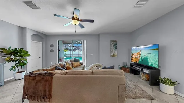 a bathroom with a tub a sink a mirror and a shower