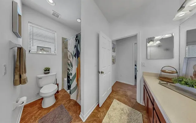 an aerial view of a house with garden space pool patio and outdoor seating