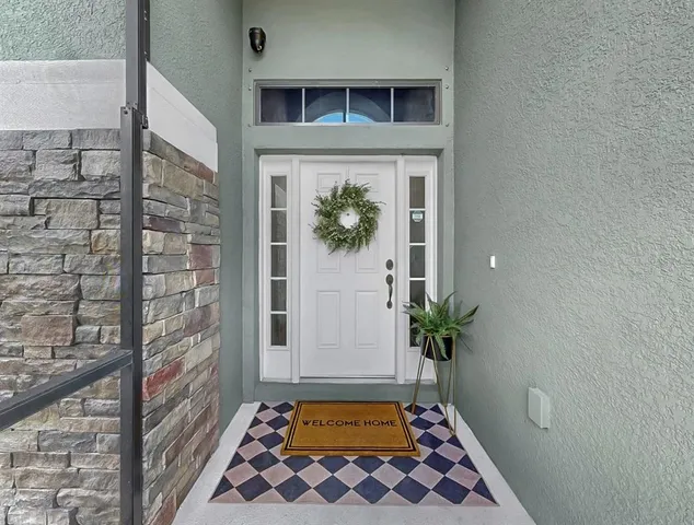 a bathroom with a shower and a sink